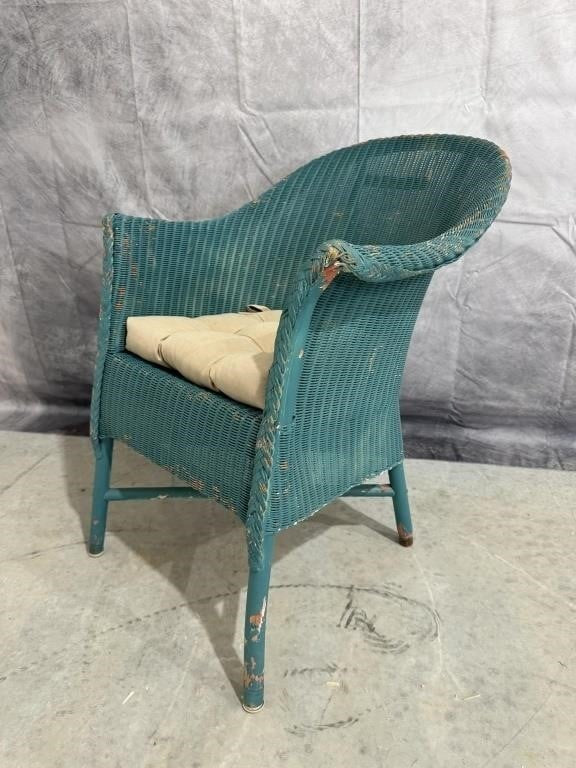 Well-Loved Turquoise Wicker Chair