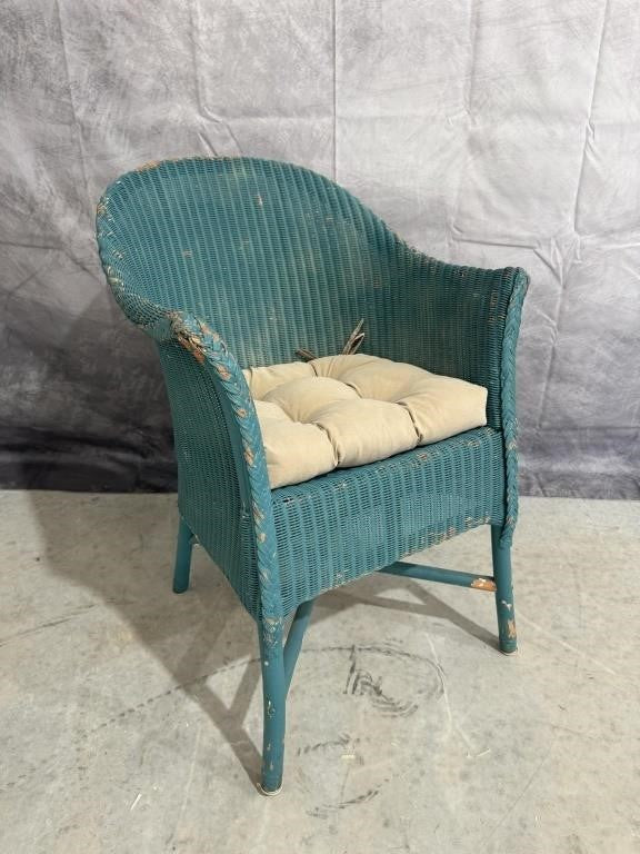 Well-Loved Turquoise Wicker Chair