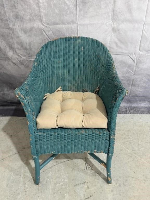 Well-Loved Turquoise Wicker Chair