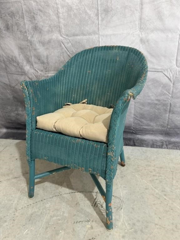 Well-Loved Turquoise Wicker Chair