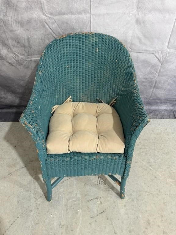 Well-Loved Turquoise Wicker Chair